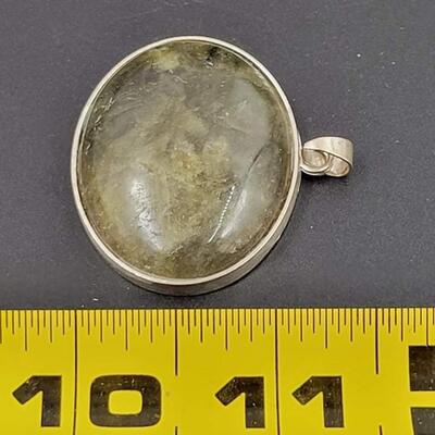 SILVER TONED OVAL PENDANT W/ RESIN STONE