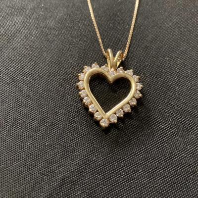 14k Gold Heart Pendant with approx. 20 Diamonds and 16” Necklace