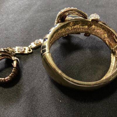 Bondage Jewelry with Bracelet and Ring â€œBuckleâ€ Style