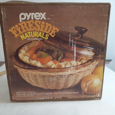 Pyrex by corning casserole dish with Wicker basket