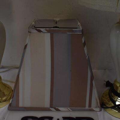 2 lamps with shades, 1 extra shade, lamp colors: cream nd white w/gold trim