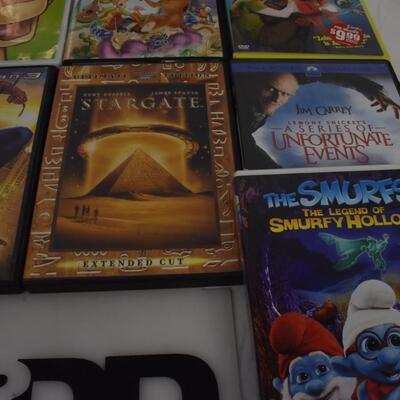 13 pc Movies on DVD: Annie, Hachi, Insurgent,  Scooby-Doo, Smurfs, Spiderman, Stargate