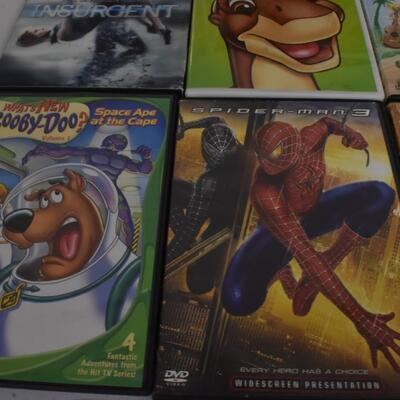 13 pc Movies on DVD: Annie, Hachi, Insurgent,  Scooby-Doo, Smurfs, Spiderman, Stargate