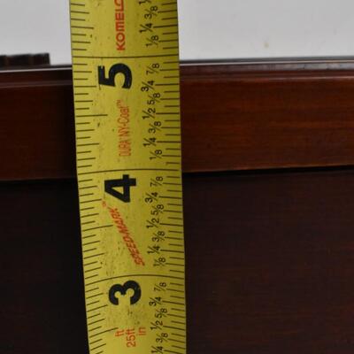 Wood  32 in tall working Grandfather clock w/key, hanging, mahogany colored wood