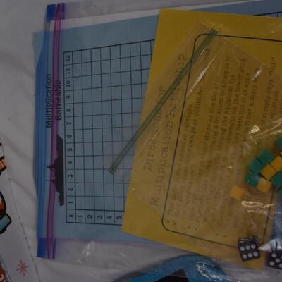 Kids lot: reusable sticker books, frogs, Multiplication Battleship, lunch cooler