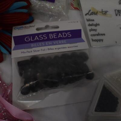 Craft lot: beads, tags, snowflakes, flowers, buffalo snow, rhinestone strass,