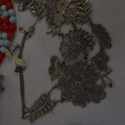 Large lot Kitsch/Unique Costume Jewelry: Beads, bracelets, necklaces, ring w/purple stone