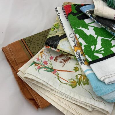 -129- Ten Printed Tea Towels