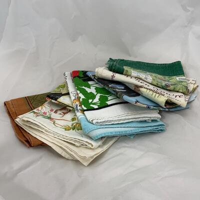 -129- Ten Printed Tea Towels