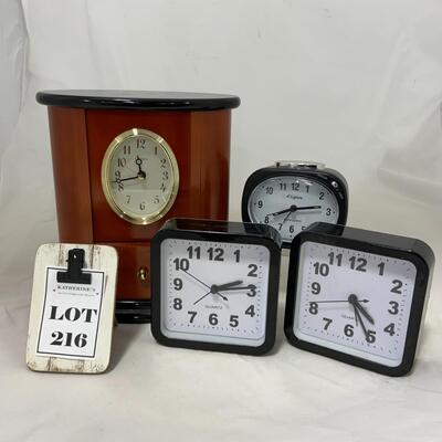 -216- Four Modern Battery-Operated Clocks