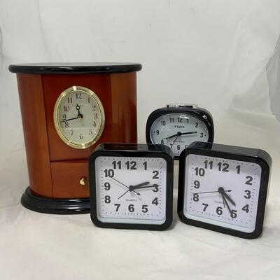 -216- Four Modern Battery-Operated Clocks