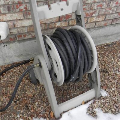 LOT 113  WATER HOSE AND HOSE REEL