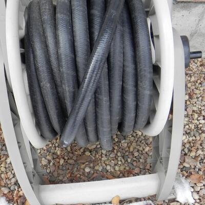 LOT 113  WATER HOSE AND HOSE REEL