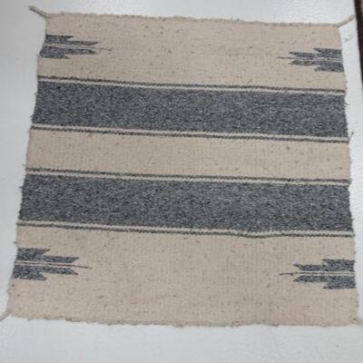 LOT 562. TWO SMALL NAVAJO RUGS