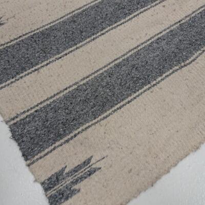 LOT 562. TWO SMALL NAVAJO RUGS