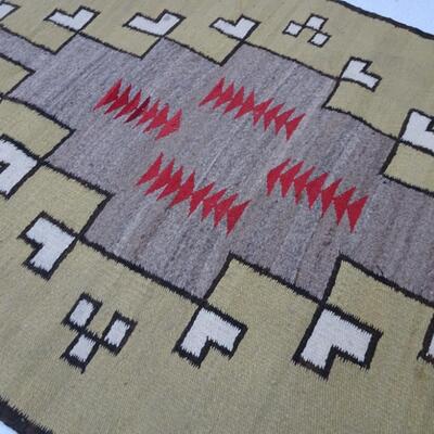 LOT 562. TWO SMALL NAVAJO RUGS