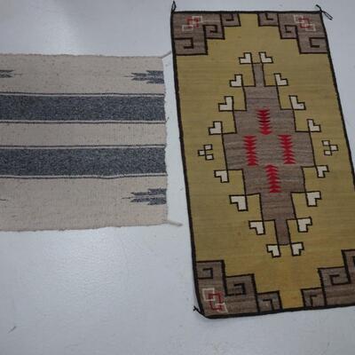LOT 562. TWO SMALL NAVAJO RUGS