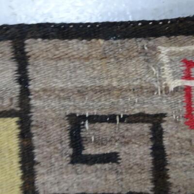 LOT 562. TWO SMALL NAVAJO RUGS