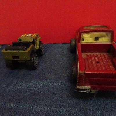 LOT 625 TOY TRUCKS AND BOAT