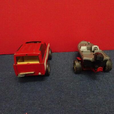 LOT 625 TOY TRUCKS AND BOAT