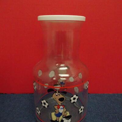 LOT 629.   1984 WORLD CUP  USA LIBBEY JUICE GLASSES AND JUICE CONTAINER