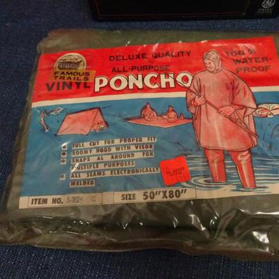 LOT 630. VINTAGE GE PORTABLE RADIO, SCALE AND VINTAGE PONCHO