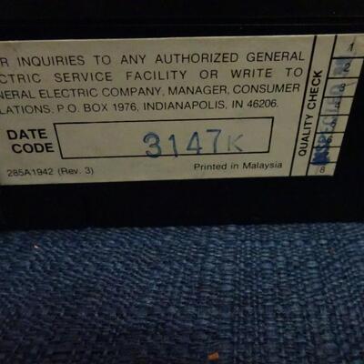 LOT 630. VINTAGE GE PORTABLE RADIO, SCALE AND VINTAGE PONCHO