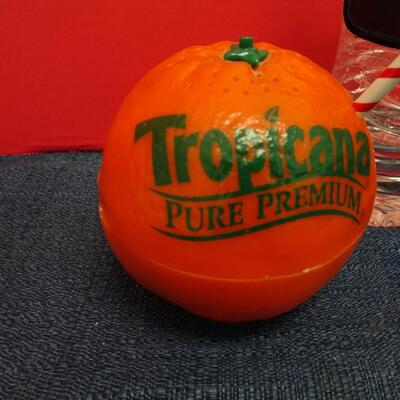 LOT 563 TROPICANA ORANGE RADIO AND CLOCK RADIO