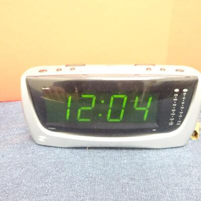 LOT 563 TROPICANA ORANGE RADIO AND CLOCK RADIO