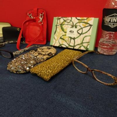 LOT #564. GLASSES , ACCESSORIES AND ORGINS SOAP