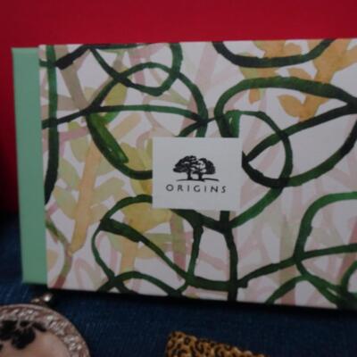 LOT #564. GLASSES , ACCESSORIES AND ORGINS SOAP