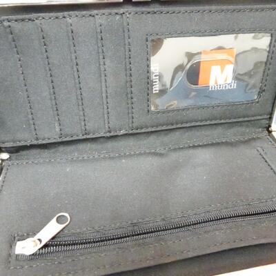 LOT 565. COLLECTION OF WALLETS