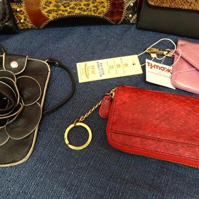 LOT 565. COLLECTION OF WALLETS