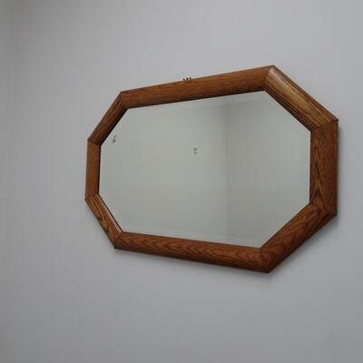 LOT 581. WALL MIRROR WITH OAK TRIM