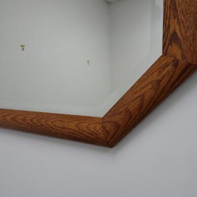 LOT 581. WALL MIRROR WITH OAK TRIM