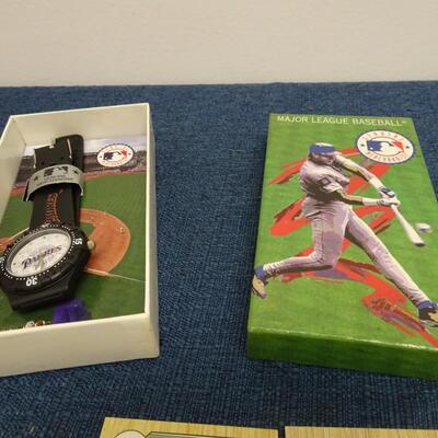 LOT 587 SMALL COLLECTION OF BASEBALLS AND CARDS AND WATCH