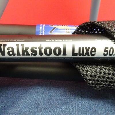 LOT 599. TWO  WALKSTOOL BRAND  ALUMINUM FOLDING STOOLS (MADE IN SWEDEN)
