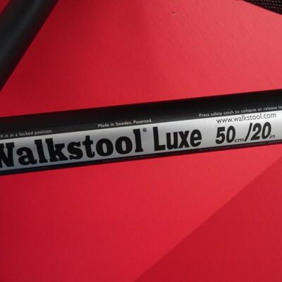 LOT 602. TWO  WALKSTOOL BRAND  ALUMINUM FOLDING STOOLS (MADE IN SWEDEN)