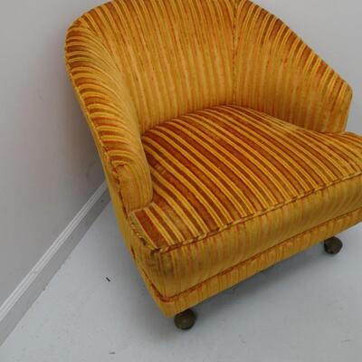 LOT 603. VINTAGE CHAIR ON CASTERS