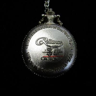 LOT 54  POCKET WATCH IN COMMEMORATION OF THE FIRST FLIGHT