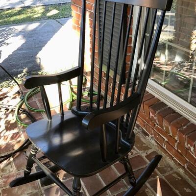 2 outdoor black rocking chairs