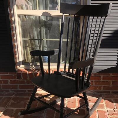 2 outdoor black rocking chairs