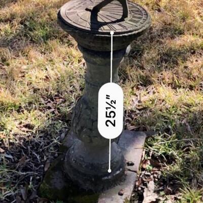 Cement outdoor sundial statue