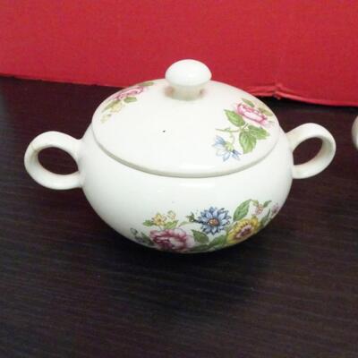 LOT 635. CREAMER SUGAR SET AND  PORCELAIN CARRIAGE