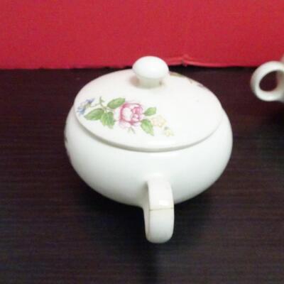LOT 635. CREAMER SUGAR SET AND  PORCELAIN CARRIAGE