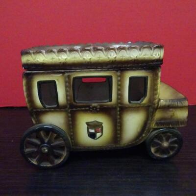 LOT 635. CREAMER SUGAR SET AND  PORCELAIN CARRIAGE