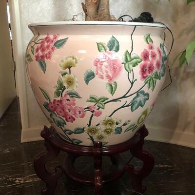 Chinese pot with tall artificial tree