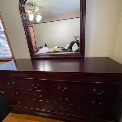 Large dresser with attached mirror