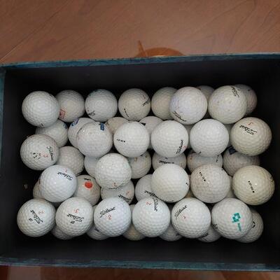Box of 50 used Titleist golf balls