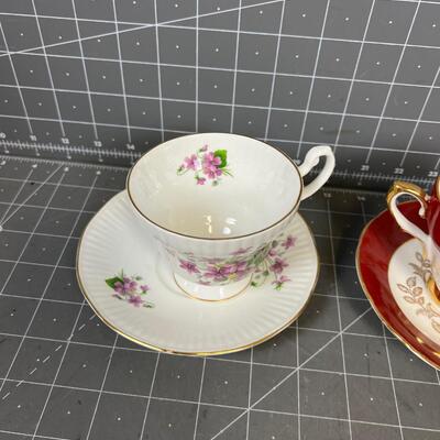 2 Tea Cups and Saucers: White and Purple and Red & Gold 